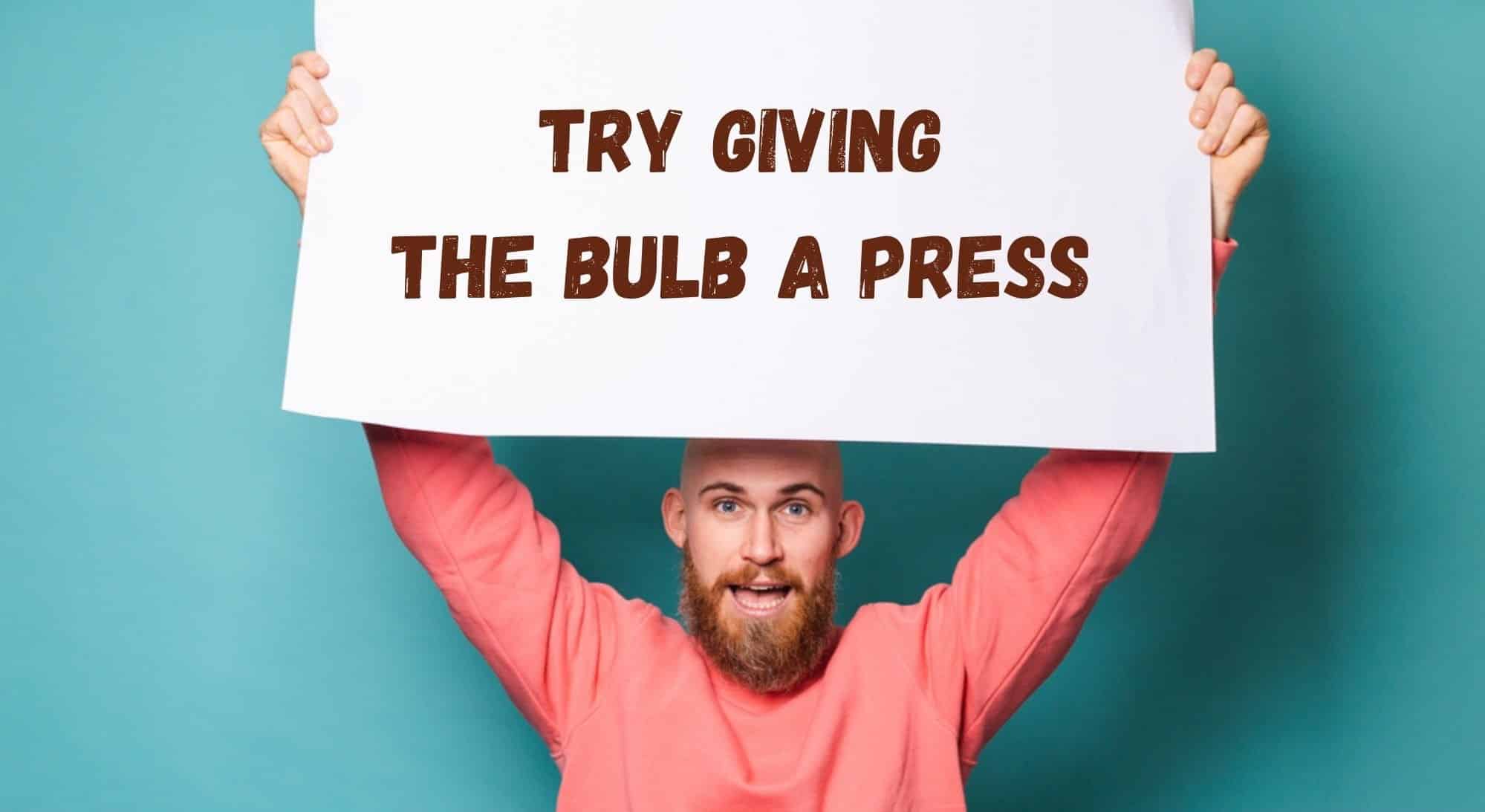 Try giving the bulb a press