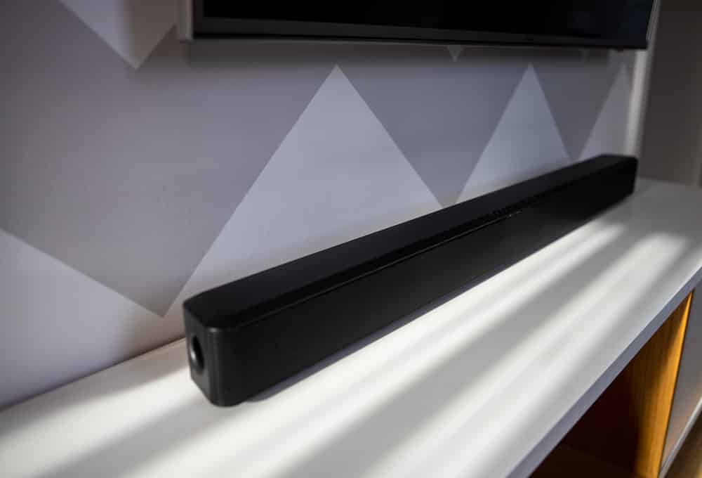 Between Sonos Arc vs Bose 900 
