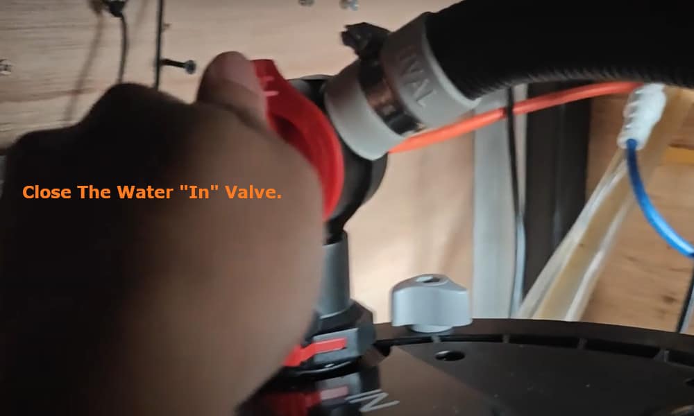 close the water IN valve.