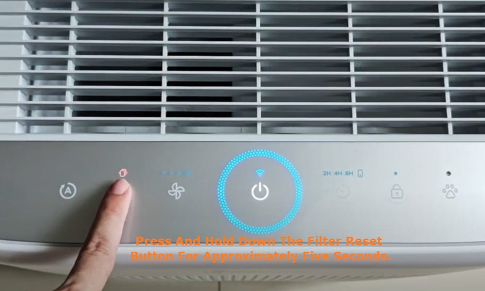 press and hold down the filter reset button for approximately five seconds.