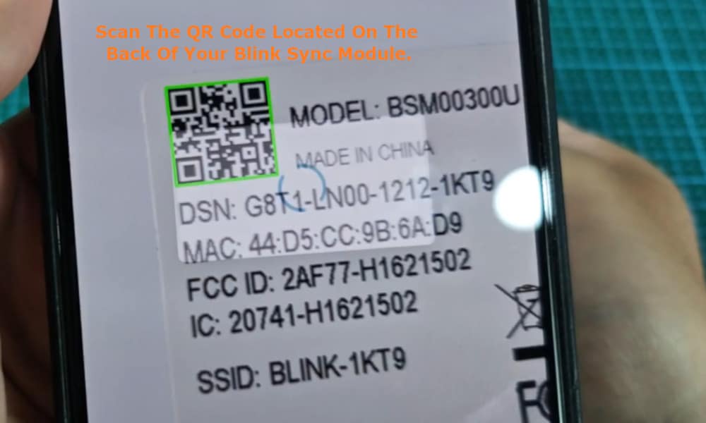 scan in the QR code located on the back of your Blink Sync Module.